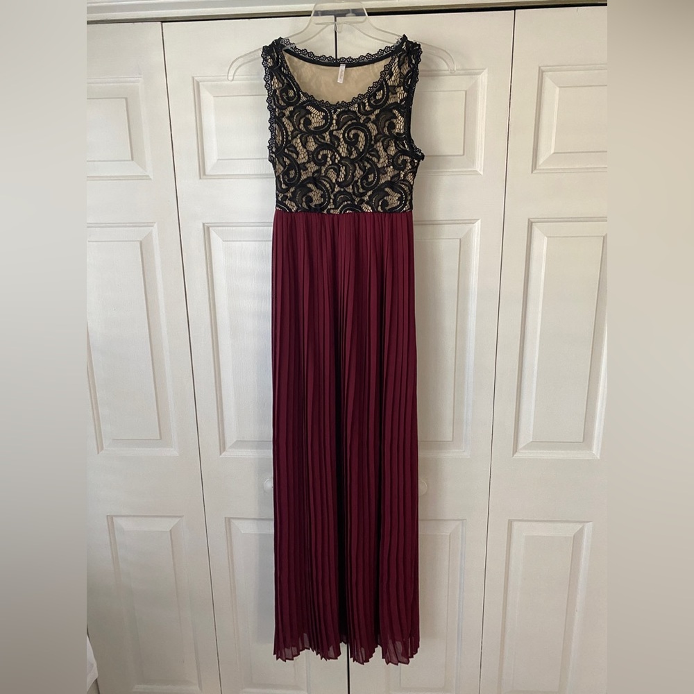 Pink Blush long flowy accordion bottom dress with lace top.